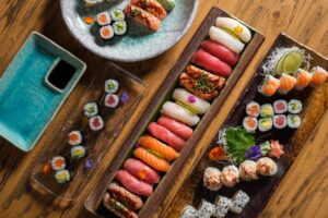 various-sushi-wooden-table-scaled